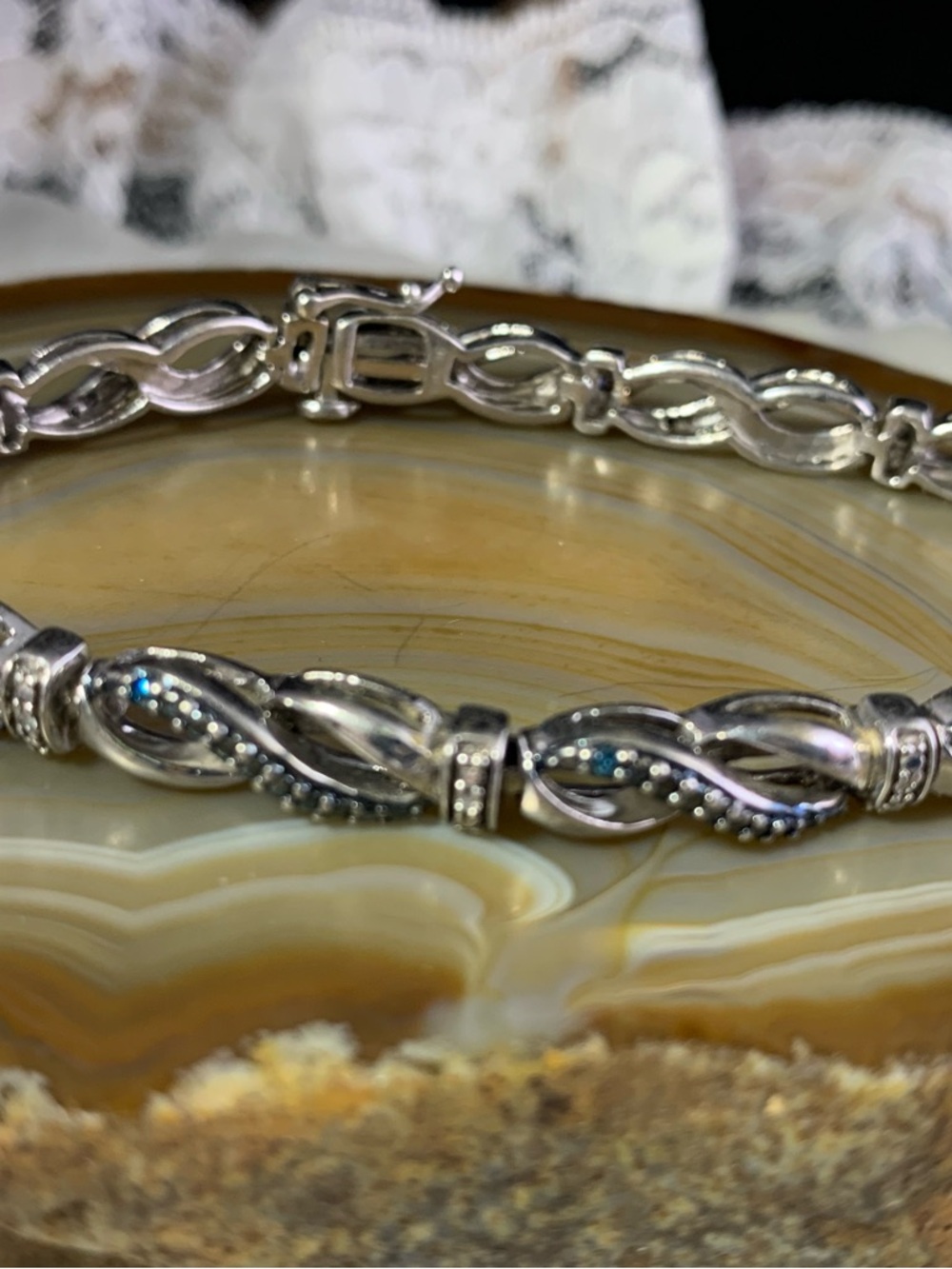 Sterling Silver Blue and White Diamond Infinity Style Bracelet